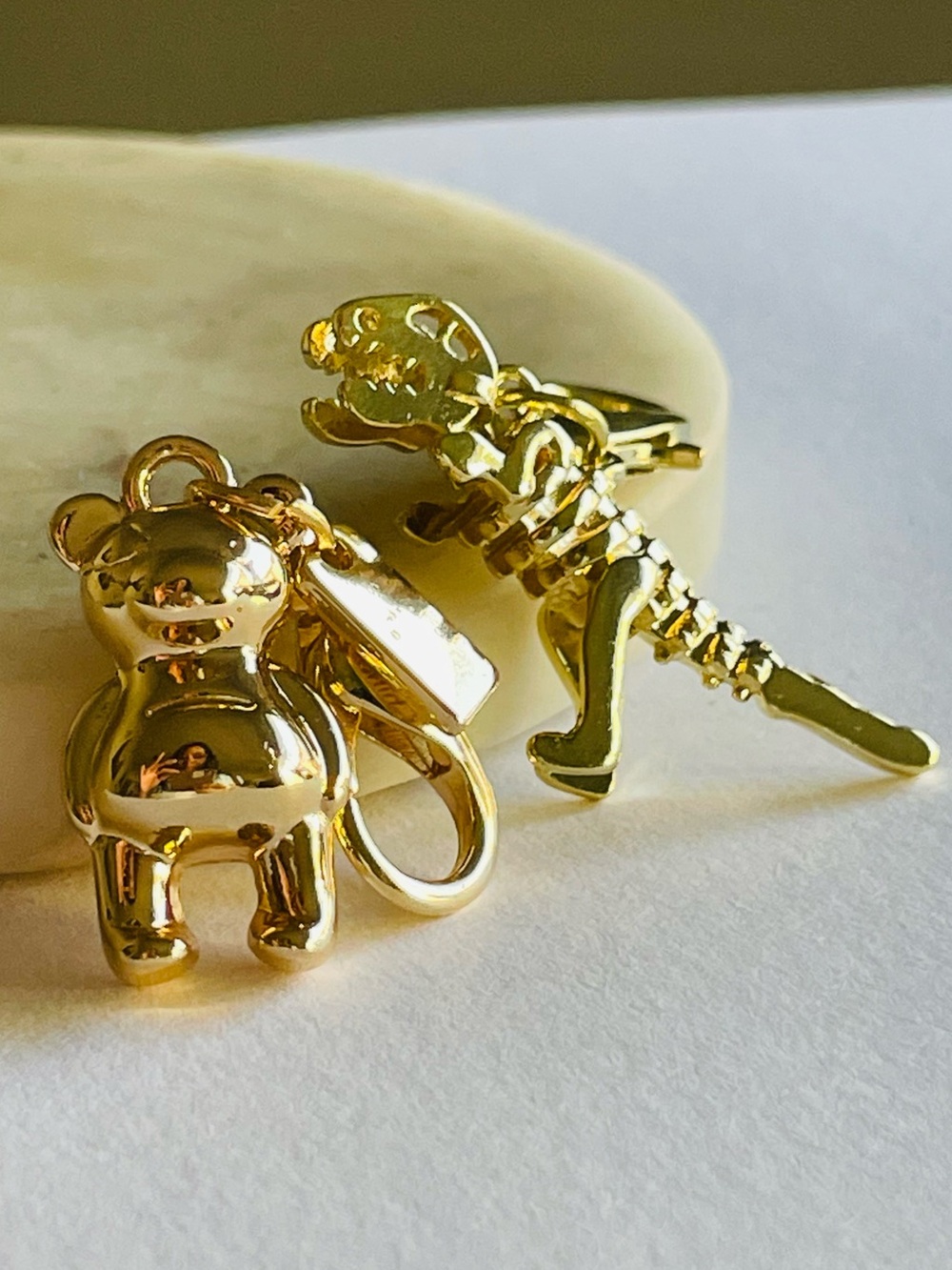 Cute polished Golden bear and dinosaur bag charms or pendants